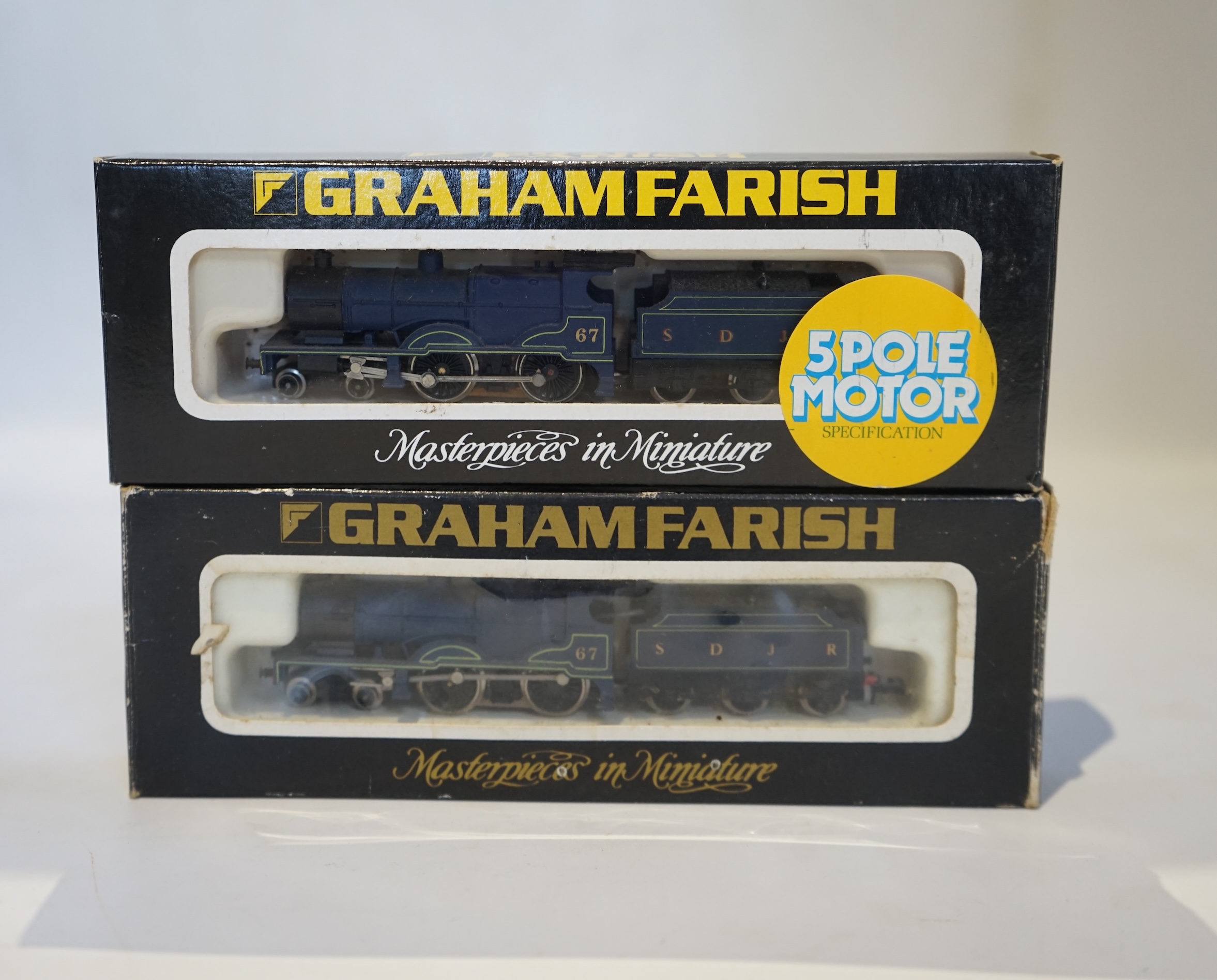 Nine boxed Graham Farish N gauge Somerset & Dorset Railway; three Class 4P 4-4-0 tender locomotives, all 67 (1207), together with five 4-wheel coaches. Condition - good.